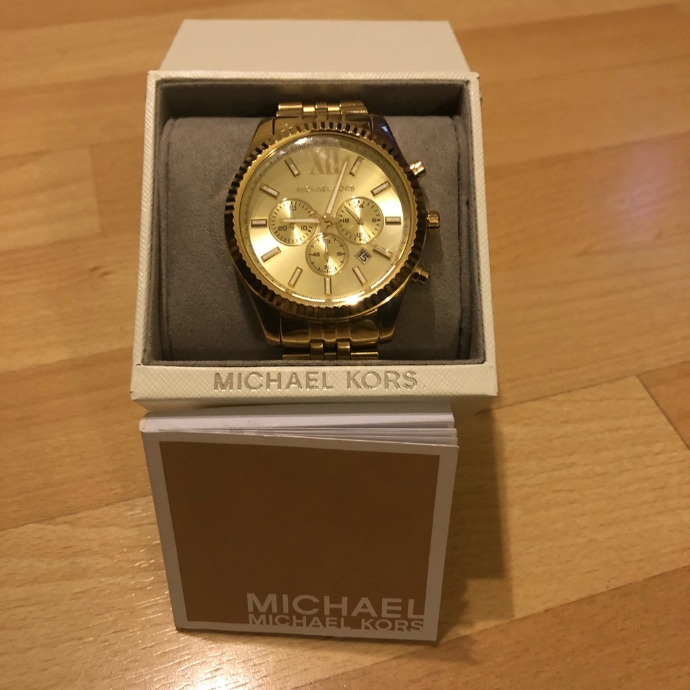 Round gold michael kors chronograph watch